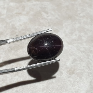 Granat gwiaździsty kaboszon 14x10 mm nr 211