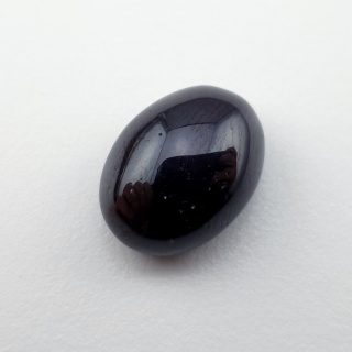 Granat gwiaździsty kaboszon 14x10 mm nr 272