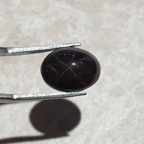 Granat gwiaździsty kaboszon 14x11 mm nr 141