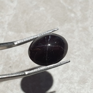 Granat gwiaździsty kaboszon 14x11 mm nr 162