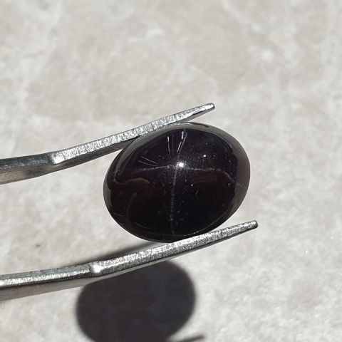 Granat gwiaździsty kaboszon 14x11 mm nr 162