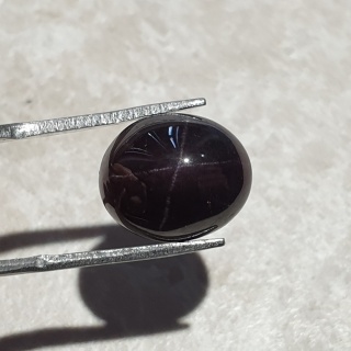 Granat gwiaździsty kaboszon 14x11 mm nr 176