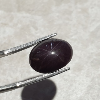 Granat gwiaździsty kaboszon 14x11 mm nr 179