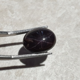 Granat gwiaździsty kaboszon 14x11 mm nr 180