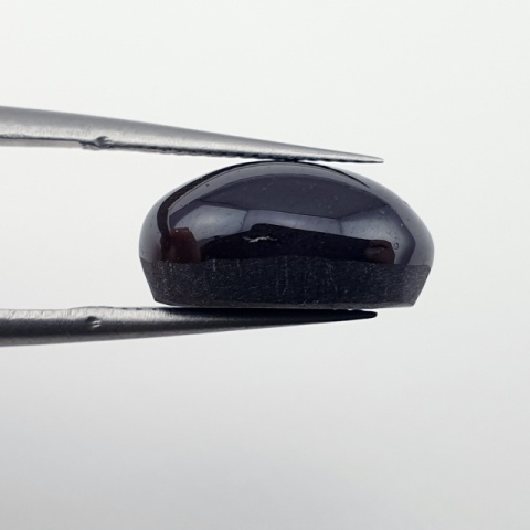 Granat gwiaździsty kaboszon 14x11 mm nr 180