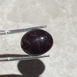 Granat gwiaździsty kaboszon 14x11 mm nr 182