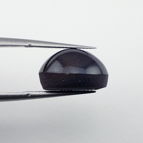 Granat gwiaździsty kaboszon 14x11 mm nr 202