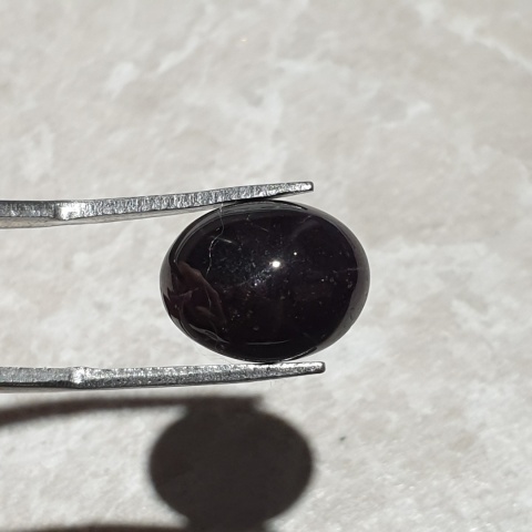 Granat gwiaździsty kaboszon 14x11 mm nr 203