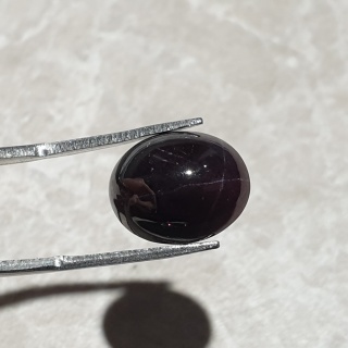 Granat gwiaździsty kaboszon 14x11 mm nr 207