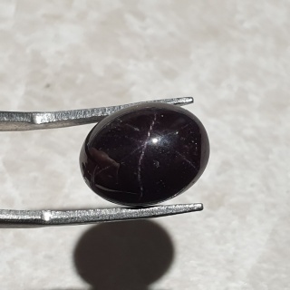 Granat gwiaździsty kaboszon 14x11 mm nr 213