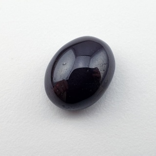 Granat gwiaździsty kaboszon 14x11 mm nr 213