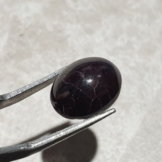 Granat gwiaździsty kaboszon 14x11 mm nr 230