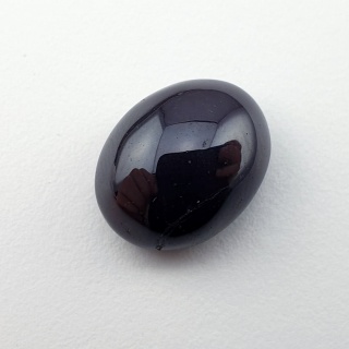 Granat gwiaździsty kaboszon 14x11 mm nr 233