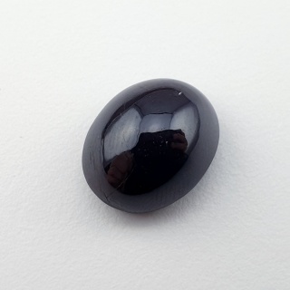 Granat gwiaździsty kaboszon 14x11 mm nr 235