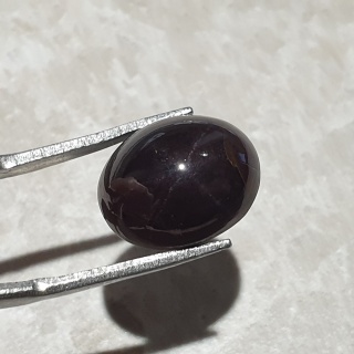 Granat gwiaździsty kaboszon 14x11 mm nr 293