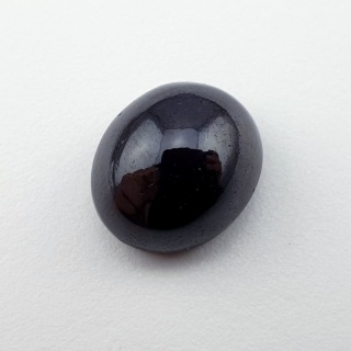 Granat gwiaździsty kaboszon 14x12 mm nr 131