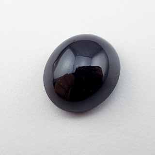 Granat gwiaździsty kaboszon 14x12 mm nr 135