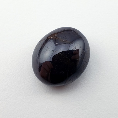 Granat gwiaździsty kaboszon 14x12 mm nr 136