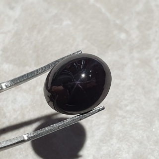 Granat gwiaździsty kaboszon 14x12 mm nr 156