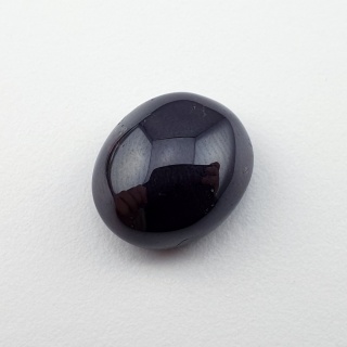 Granat gwiaździsty kaboszon 14x12 mm nr 165