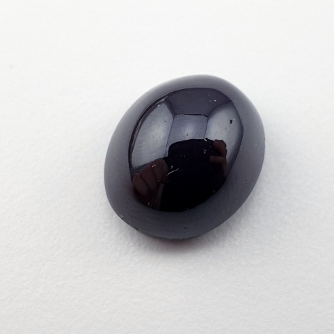 Granat gwiaździsty kaboszon 14x12 mm nr 166