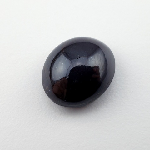 Granat gwiaździsty kaboszon 14x12 mm nr 209