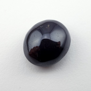 Granat gwiaździsty kaboszon 14x12 mm nr 266