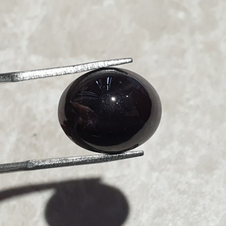 Granat gwiaździsty kaboszon 15x12 mm nr 161