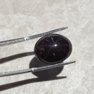 Granat gwiaździsty kaboszon 15x12 mm nr 171