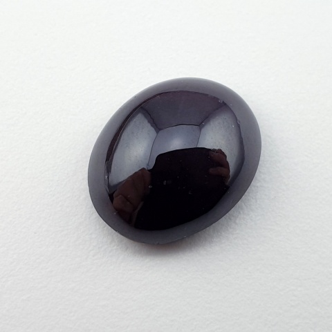 Granat gwiaździsty kaboszon 15x12 mm nr 177