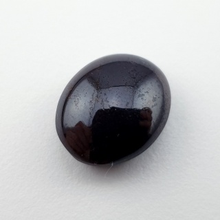 Granat gwiaździsty kaboszon 15x12 mm nr 217