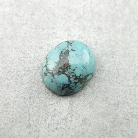 Turkus tybetański kaboszon 10x8 mm nr 310