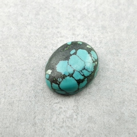 Turkus tybetański kaboszon 10x8 mm nr 314