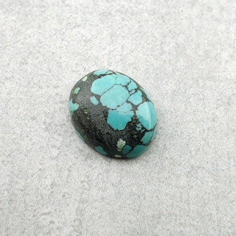 Turkus tybetański kaboszon 10x8 mm nr 314
