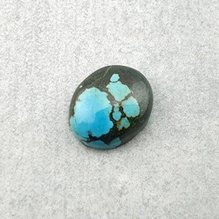 Tibetan turquoise cabochon 11x9 mm no 323