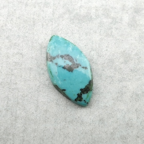 Turkus tybetański kaboszon 12x6 mm nr 331