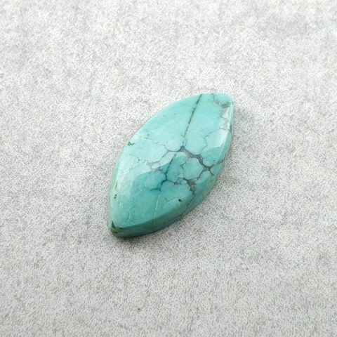 Turkus tybetański kaboszon 12x6 mm nr 332
