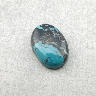 Turkus tybetański kaboszon 14x10 mm nr 370