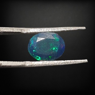 Ethiopian faceted black opal 10x8 mm no A403