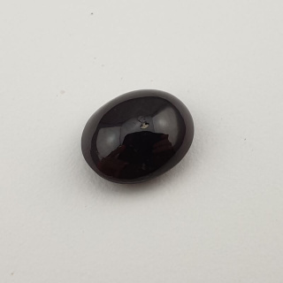 Granat gwiaździsty kaboszon 12x10 mm nr 73