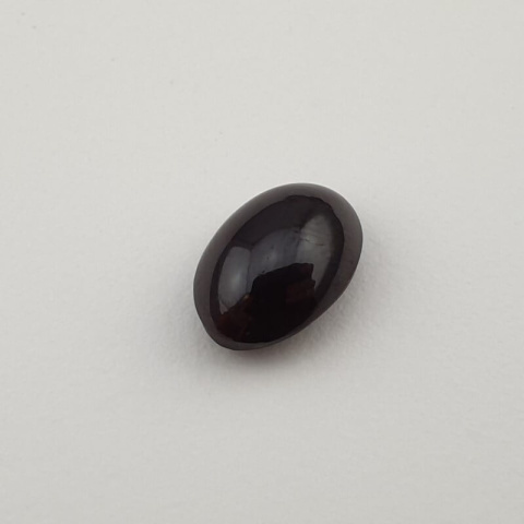 Granat gwiaździsty kaboszon 12x8 mm nr 52