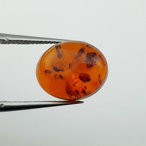 Bursztyn bałtycki kaboszon 12x10 mm nr A920