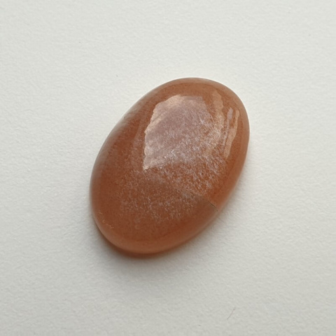 Kamień księżycowy brzoskwiniowy kaboszon 23x16 mm nr 44