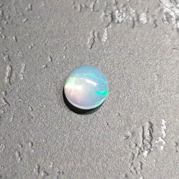 Opal z Etiopii kaboszon ~fi 4 mm nr 198