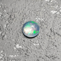 Opal z Etiopii kaboszon fi 5 mm nr 187