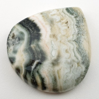 Saturn chalcedon kaboszon 38x34 mm nr 22