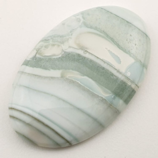 Saturn chalcedon kaboszon 46x29 mm nr 34