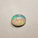 Opal z Etiopii kaboszon 9x7 mm nr 335