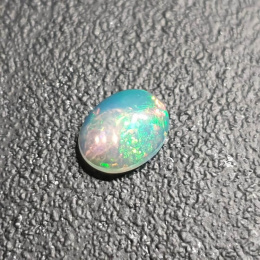 Opal z Etiopii kaboszon 9x7 mm nr 336