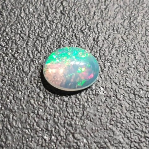 Opal z Etiopii kaboszon 9x7 mm nr 336